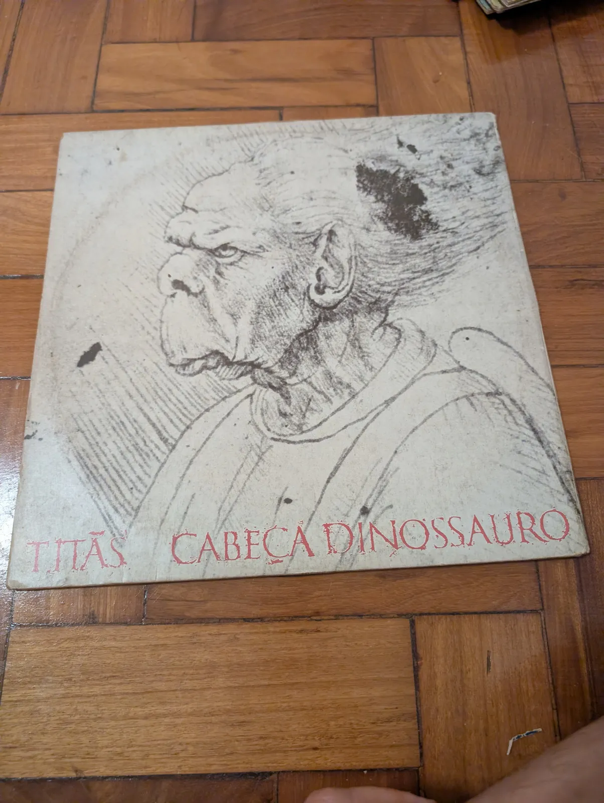 Titãs — Cabeça Dinossauro, back