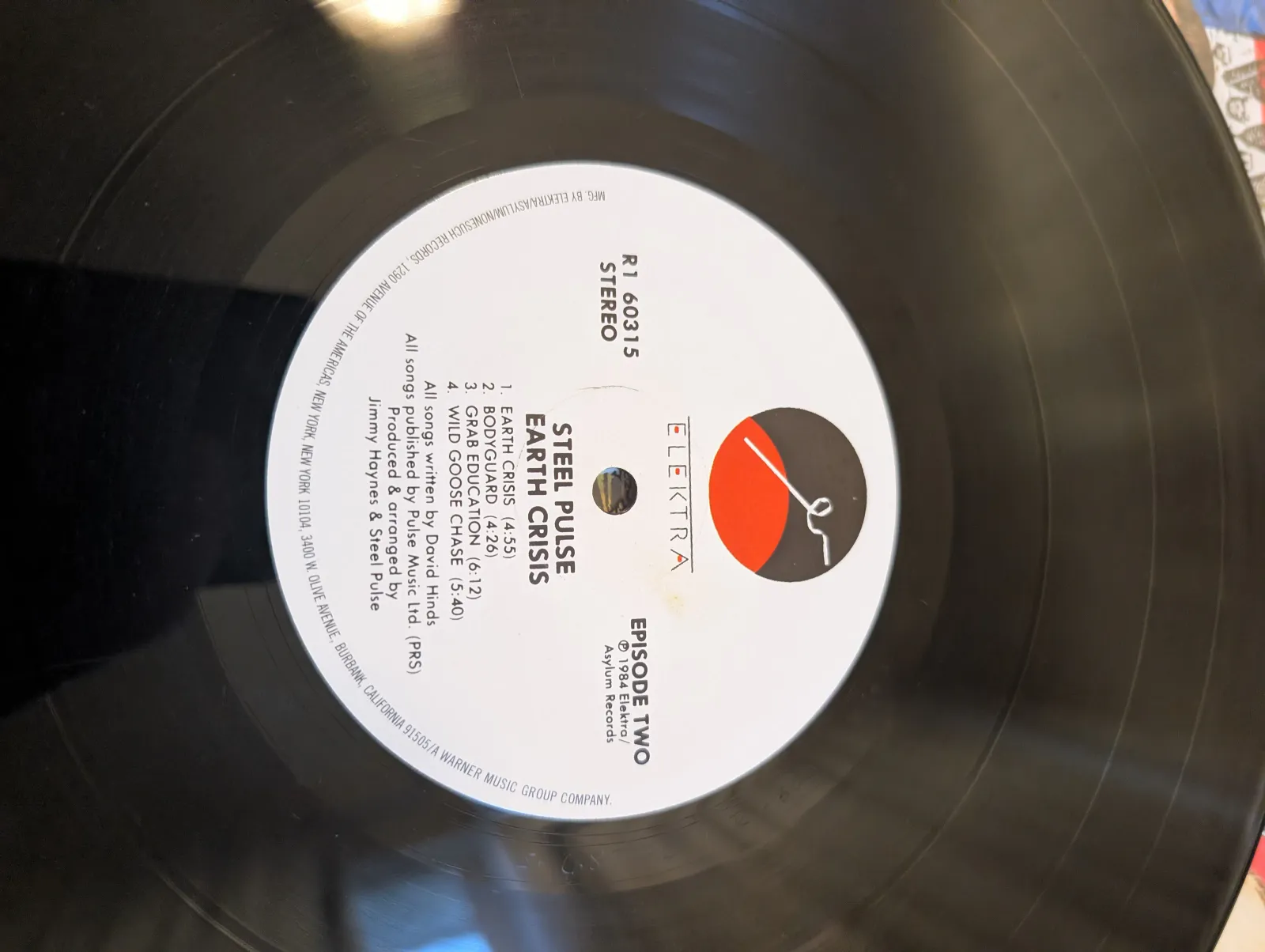Steel Pulse — Earth Crisis, label-b
